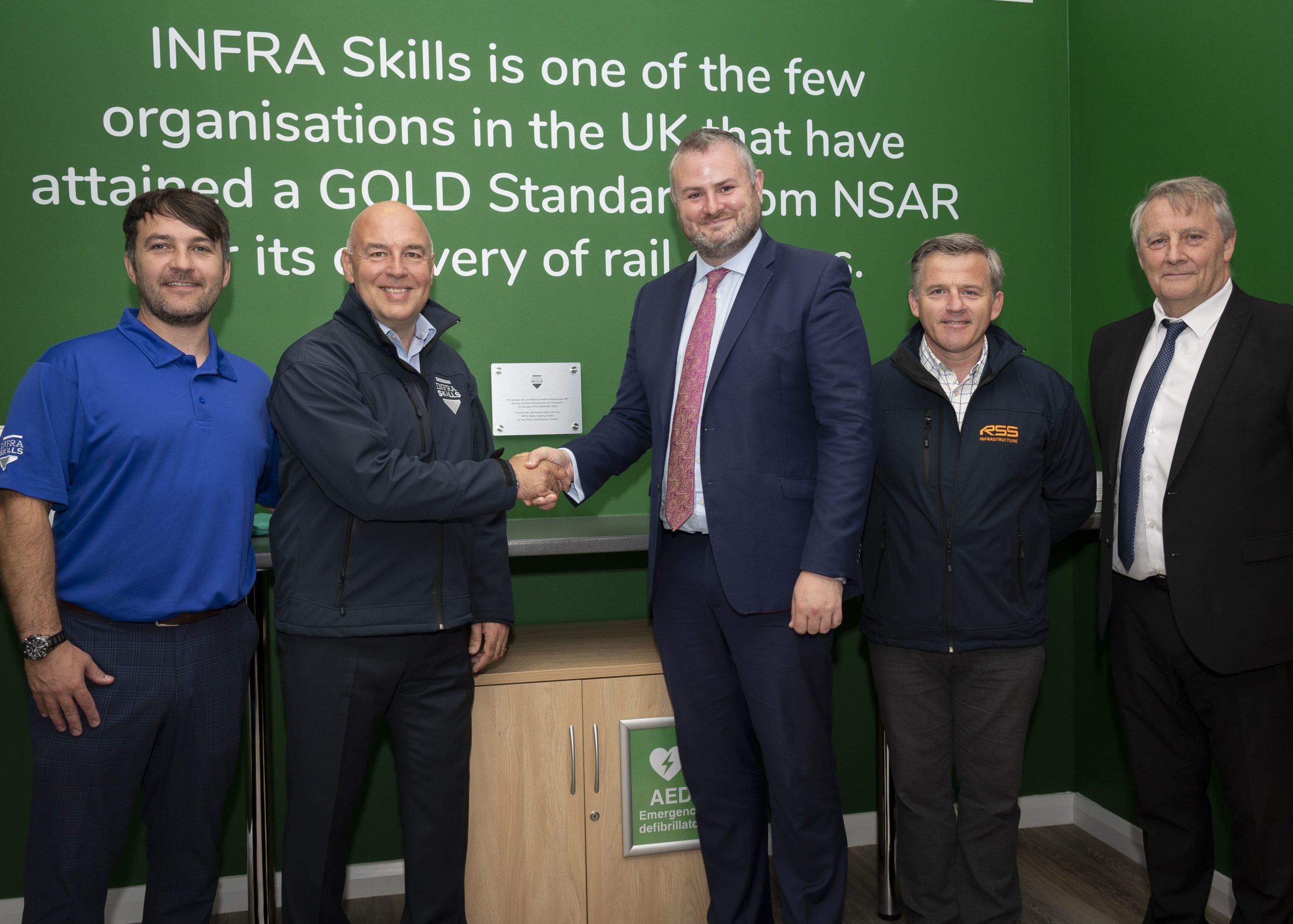 Richard Toy, CEO, Sean Harrison, Managing Director, Peter Thompson, Rail Director, and Steven Morley, General Manager are pictured with Andrew Stephenson.
